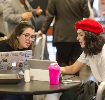 Students talking in retail dining area of Student Union at Buffalo State